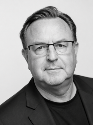 Mike Sharples - CHIEF EXPERIENCE OFFICER